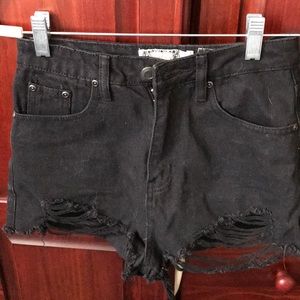 Black ripped denim shorts